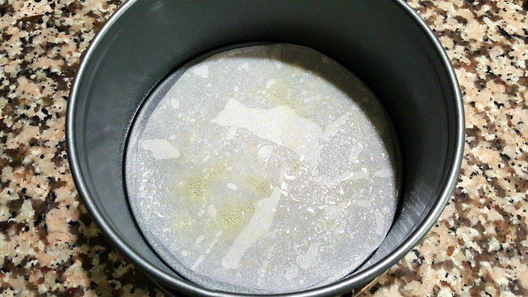 a 7 inch springform pan lined with parchment paper sprayed with non-stick spray