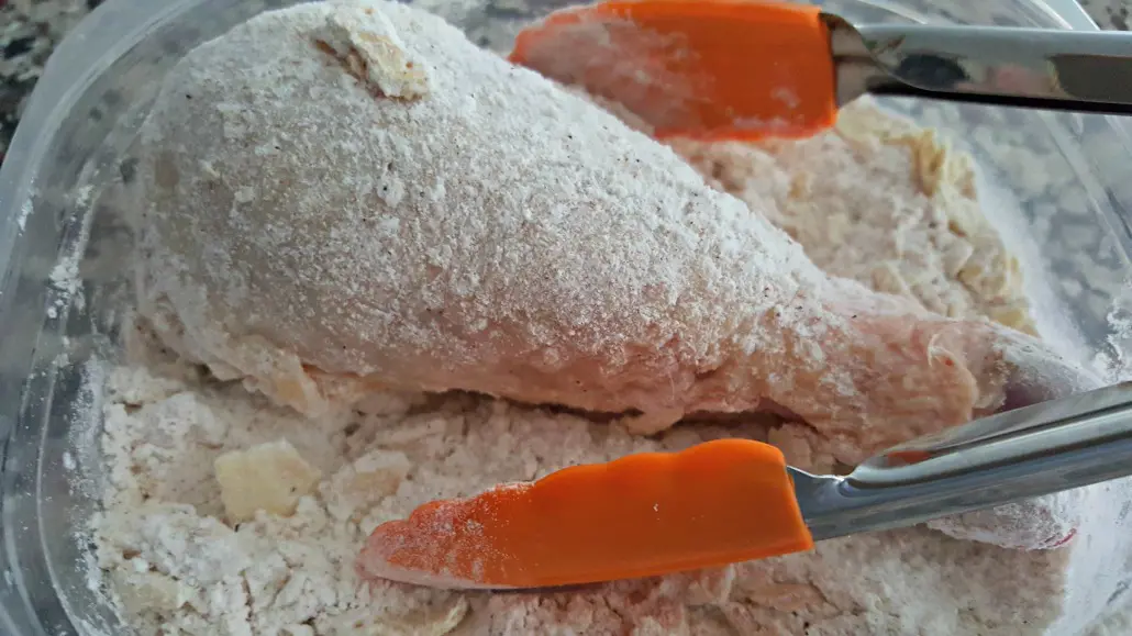 dredging chicken for first time in flour