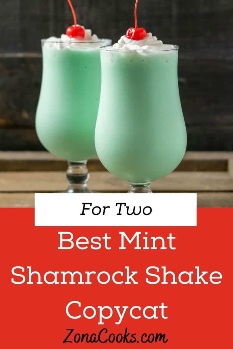 two Shamrock Shakes in tall glasses.