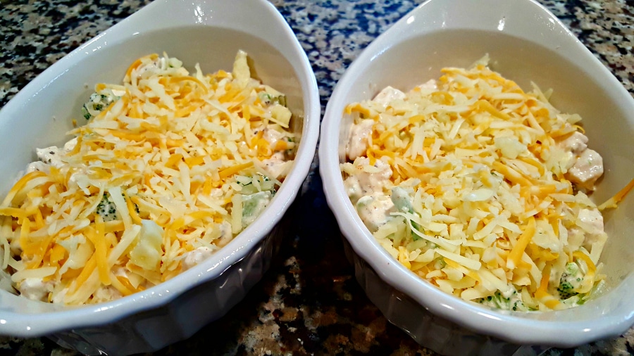 chicken broccoli casseroles sprinkled with cheese.