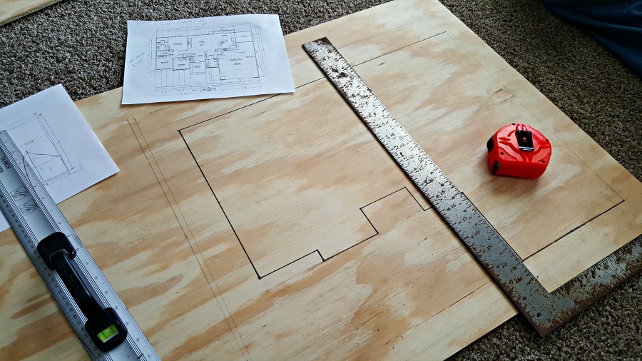 floor plan drawn on plywood for diy bird feeder