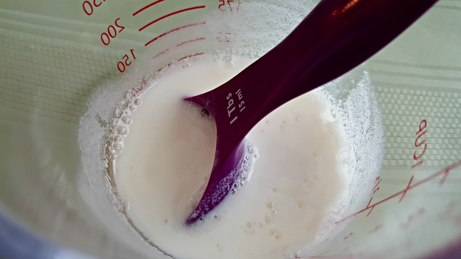 homemade buttermilk     in a measuring cup.