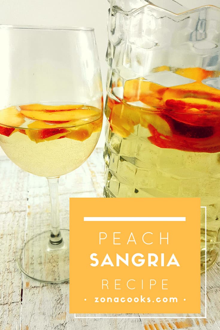 Best Ever Peach Schnapps Sangria in a glass and in a pitcher.