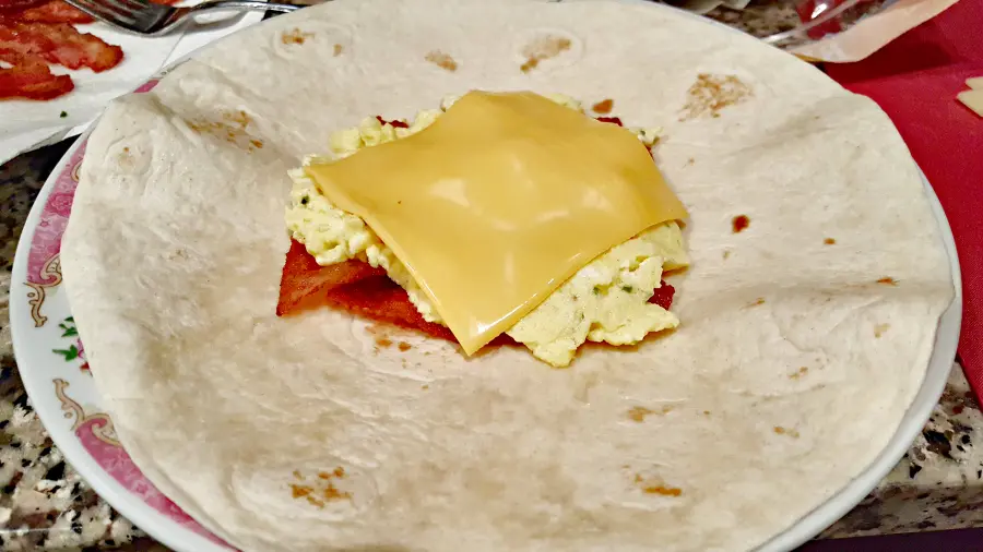 bacon, egg, and cheese on a tortilla