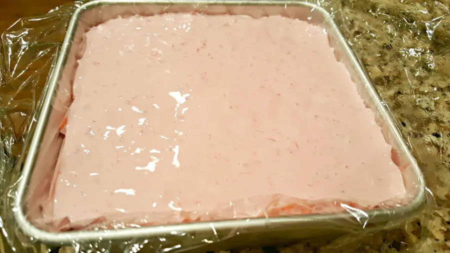 ice cream mixture layered into the Raspberry Chocolate Freezer Cake