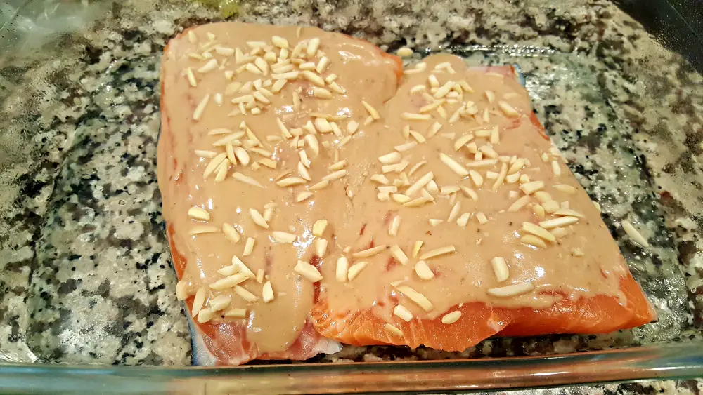 Honey Dijon Almond Salmon in a baking dish