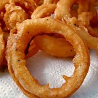 Old Fashioned Onion Rings on paper towel.