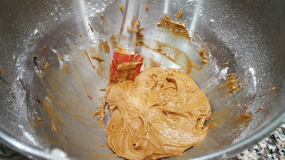 ginger molasses cookie dough in a bowl with a spatula