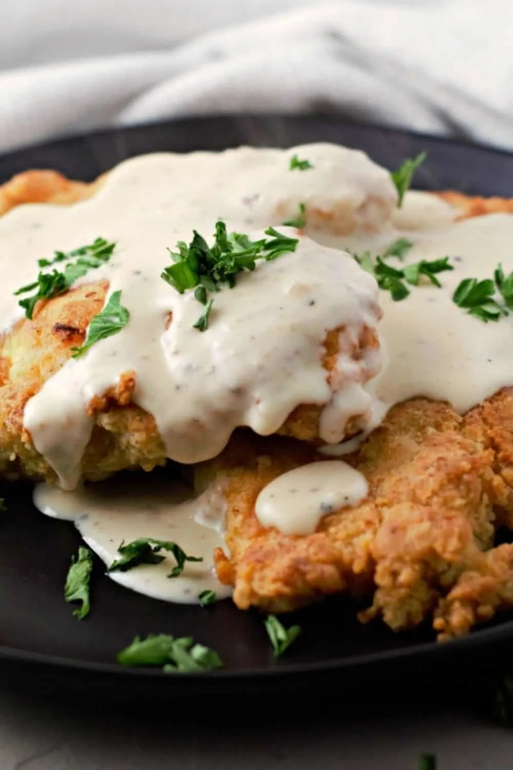 Country Fried Chicken with Gravy on a plate.