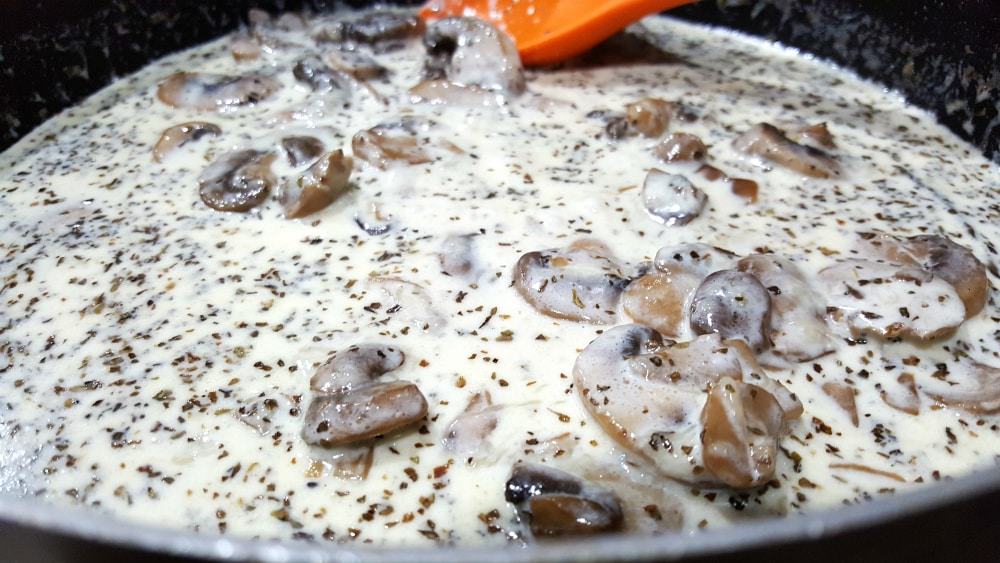 Cheese Ravioli Sauce cooking in a pan.