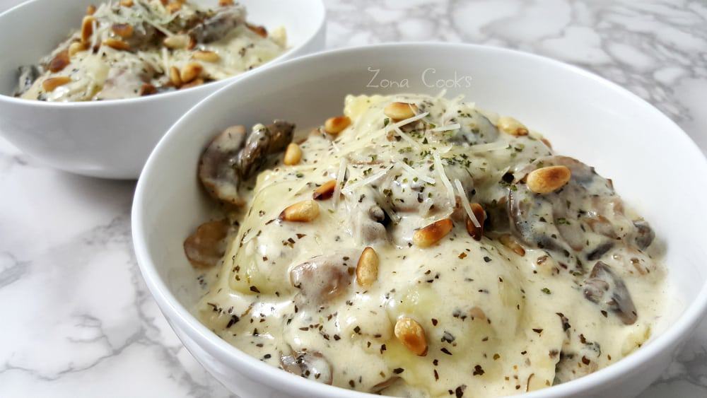 Creamy Mushroom Ravioli in two bowls.