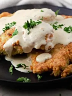Country Fried Chicken with Gravy on a plate.