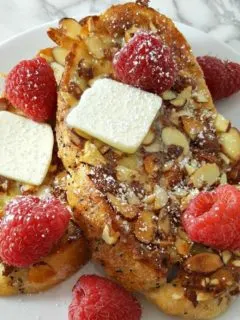 Almond Raspberry French Toast on a plate.