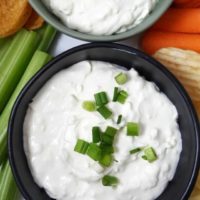 two bowls filled with 4 Ingredient Beer Cheese Dip.