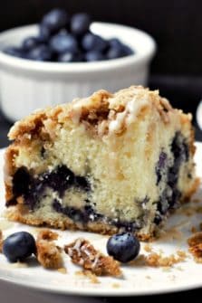 a slice of Blueberry Streusel Coffee Cake on a plate.