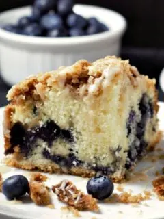 a slice of Blueberry Streusel Coffee Cake on a plate.