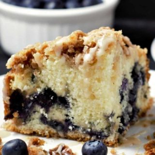 a slice of Blueberry Streusel Coffee Cake on a plate.