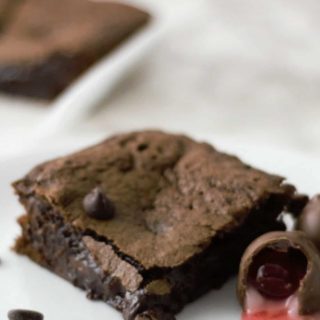 Chocolate Covered Cherry Cordial Brownies on a plate.