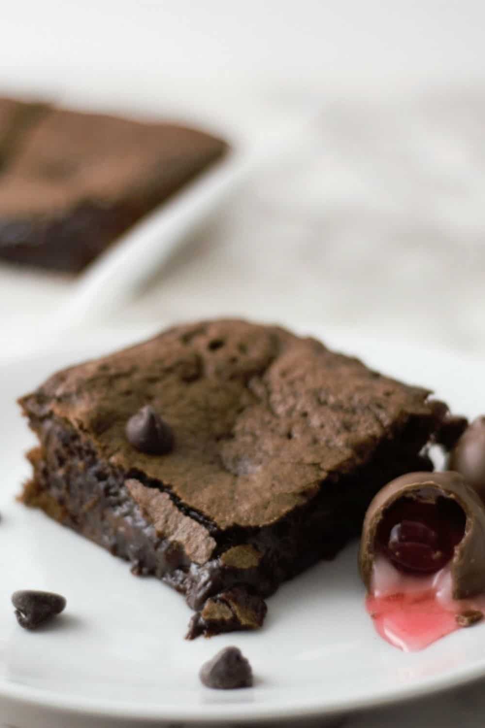 Chocolate Covered Cherry Cordial Brownies on a plate.