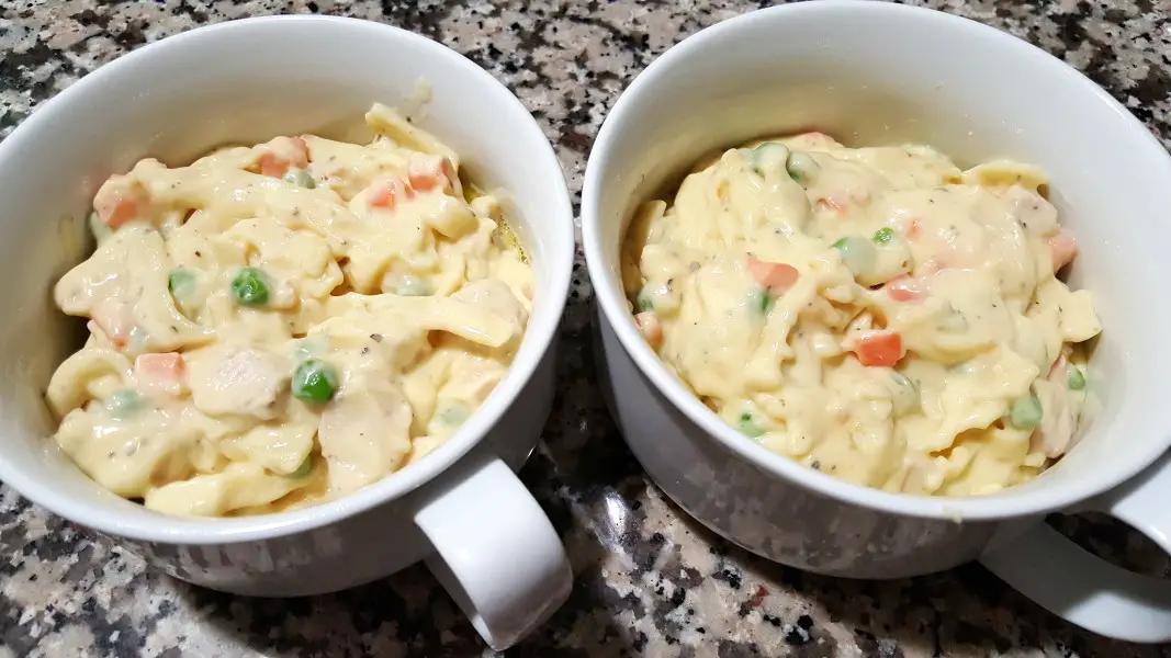 uncooked Creamy Chicken Noodle Casserole in two casserole baking dishes.