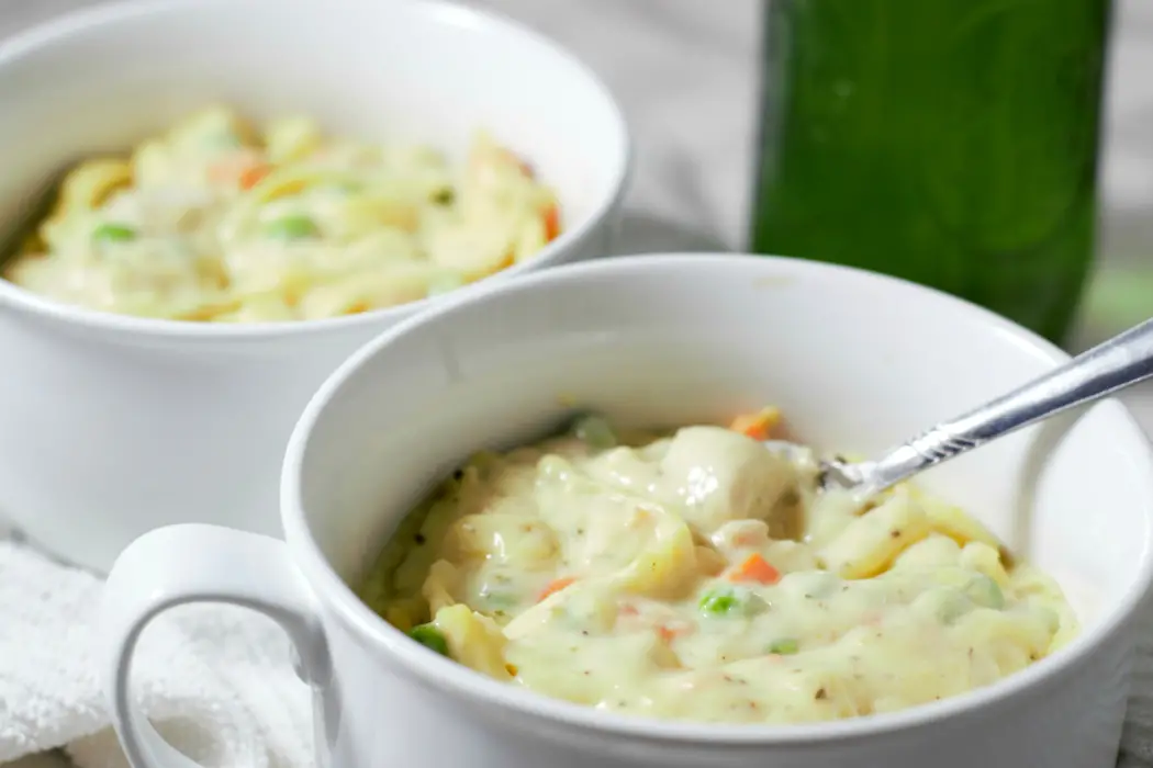 Creamy Chicken Noodle Casserole in two baking dishes.