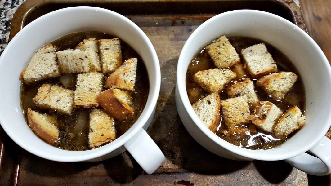 Easy French Onion Soup Recipe with Croutons in two soup bowls.