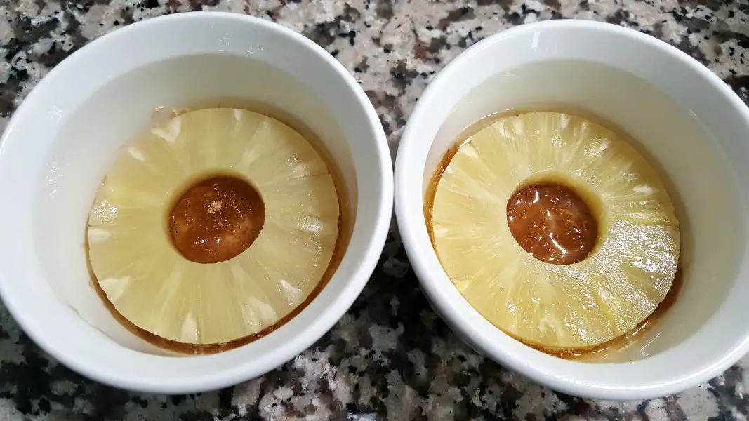 pineapple rings in two ramekins.