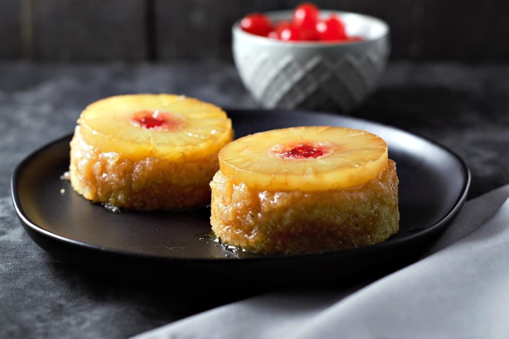 Mini Pineapple Upside Down Cakes on a plate.