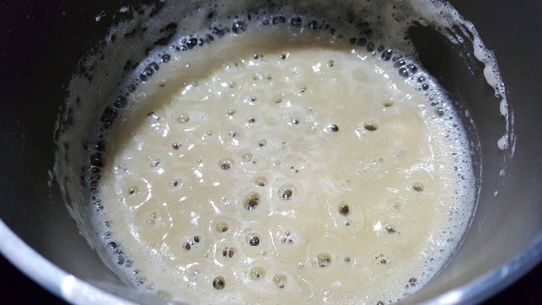 butter and flour cooking in a sauce pan