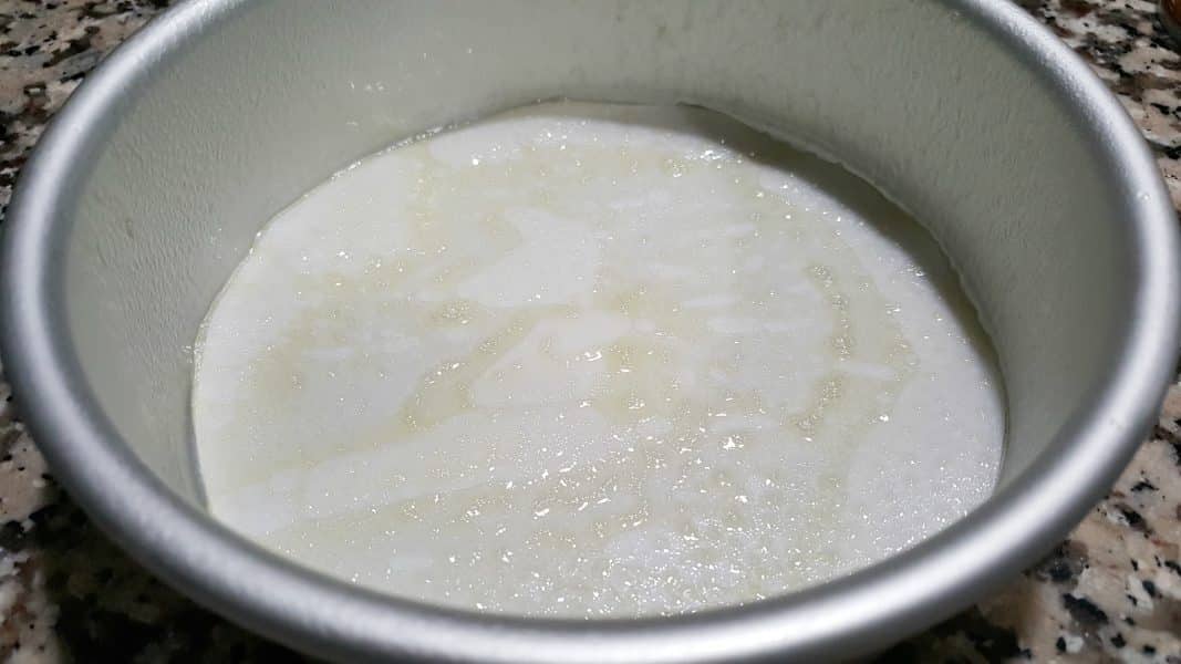 a 6 inch cake pan lined with parchment and sprayed with cooking spray