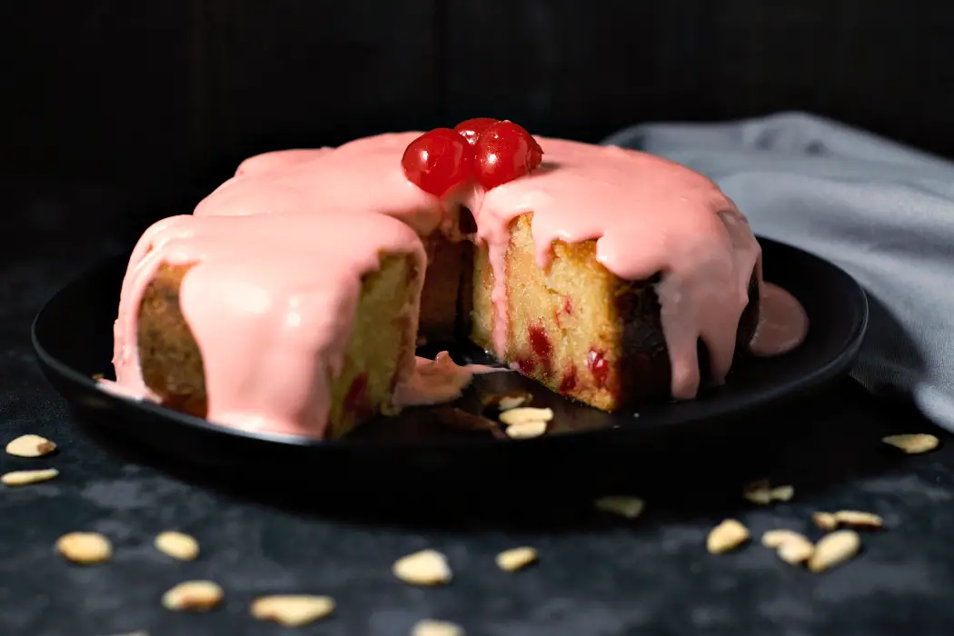 Cherry & Almond Cake on a plate.