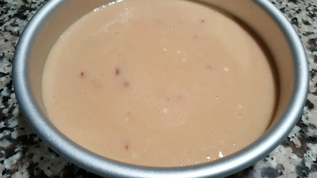 batter for Maraschino Cherry Cake Recipe in a 6 inch cake pan.