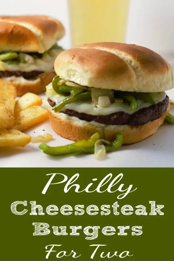 Philly Cheesesteak Burgers for Two with a side of fries and beer.