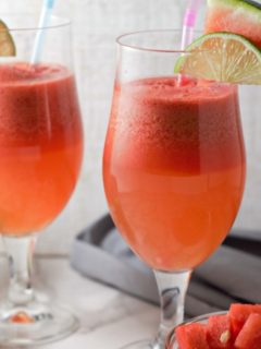 two glasses filled with Watermelon Sangria.