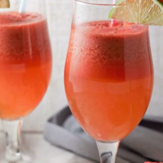 two glasses filled with Watermelon Sangria.