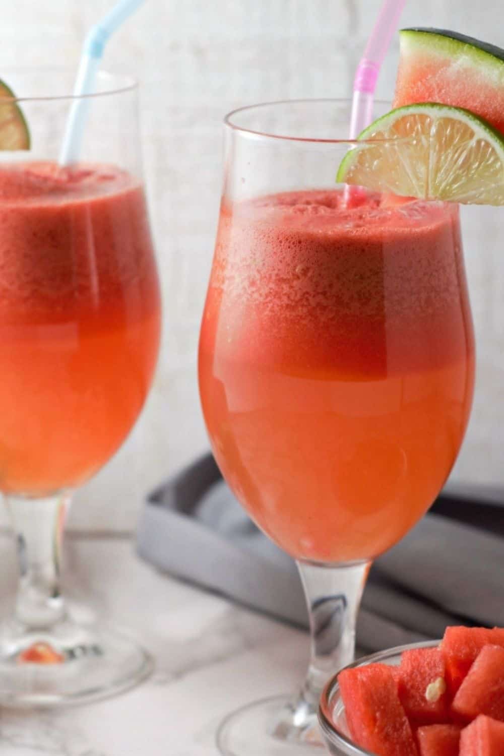 two glasses filled with Watermelon Sangria.