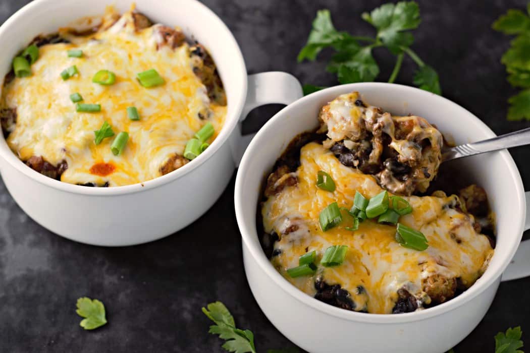 two Baked Individual Taco Tater Tot Casseroles.