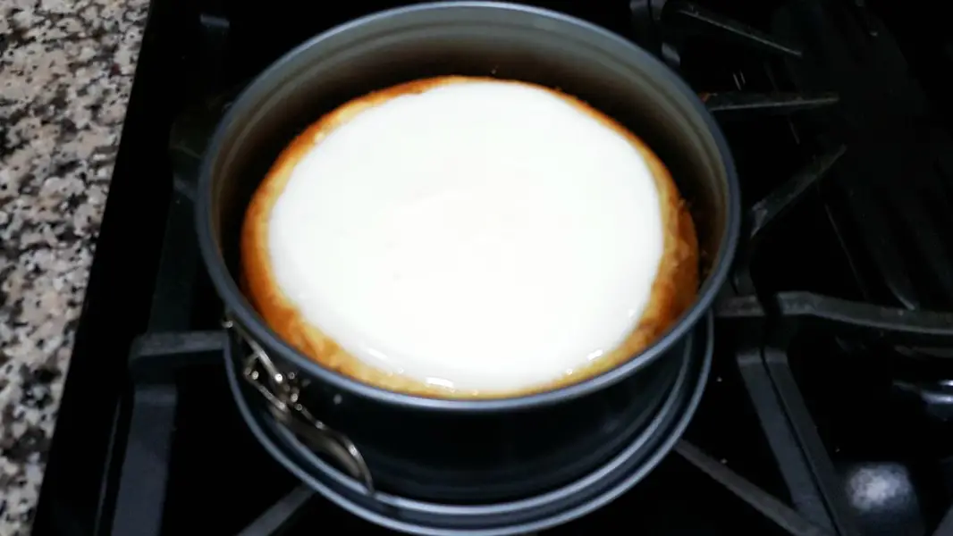 baked amaretto cheesecake topped with sour cream mixture topping.