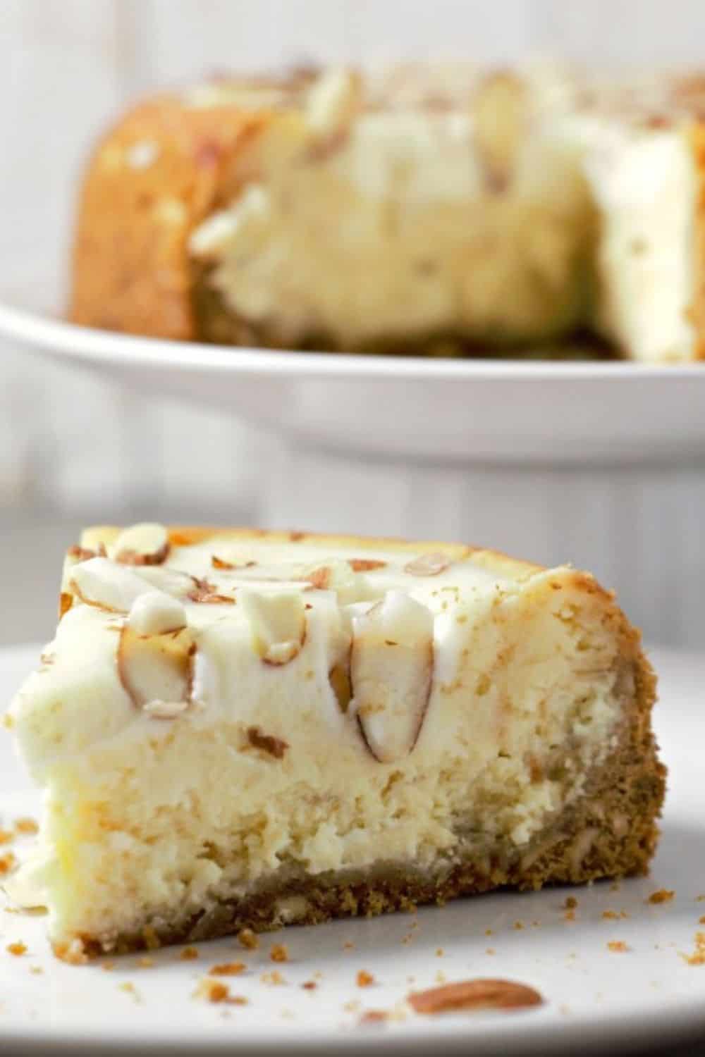 White Chocolate and Almond Amaretto Cheesecake on a plate.
