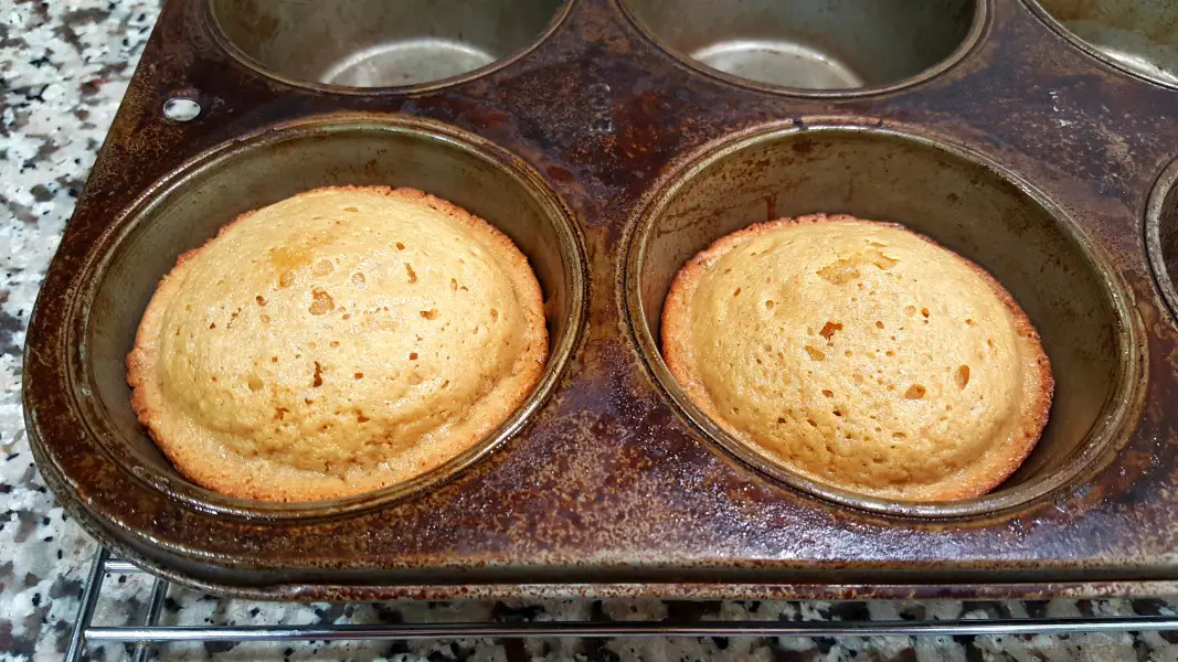 two peanut butter cookie cups baked in a jumbo muffin tin.