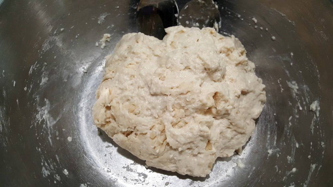 pizza dough mixed together in a ball.