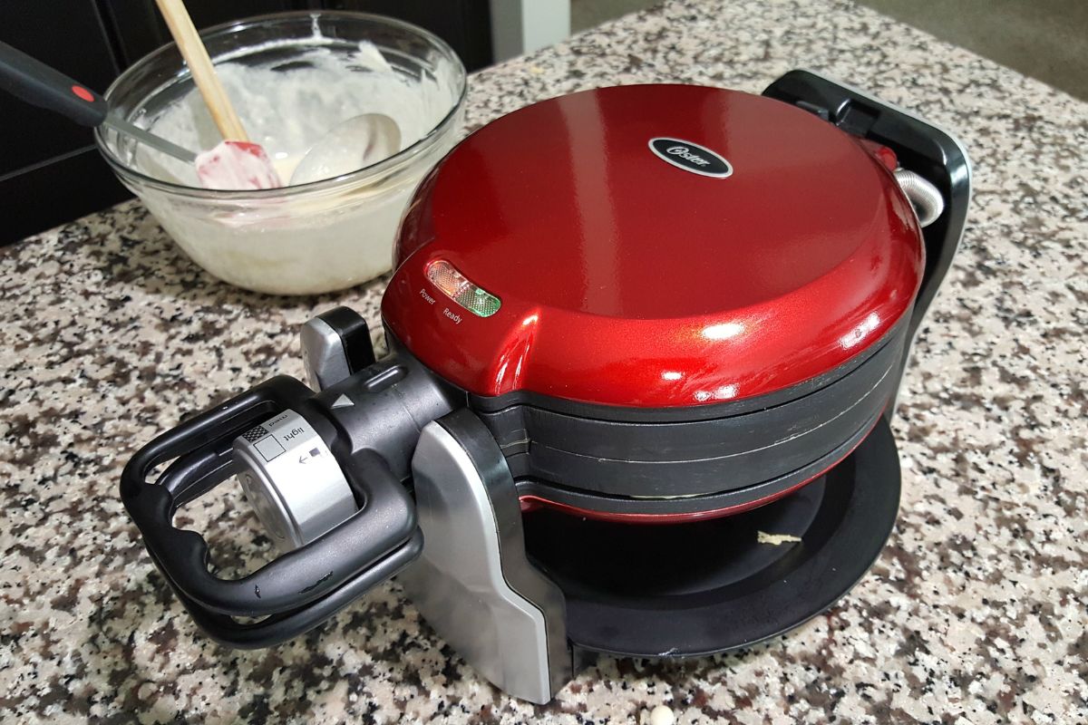 a double-sided waffle maker and waffle batter.