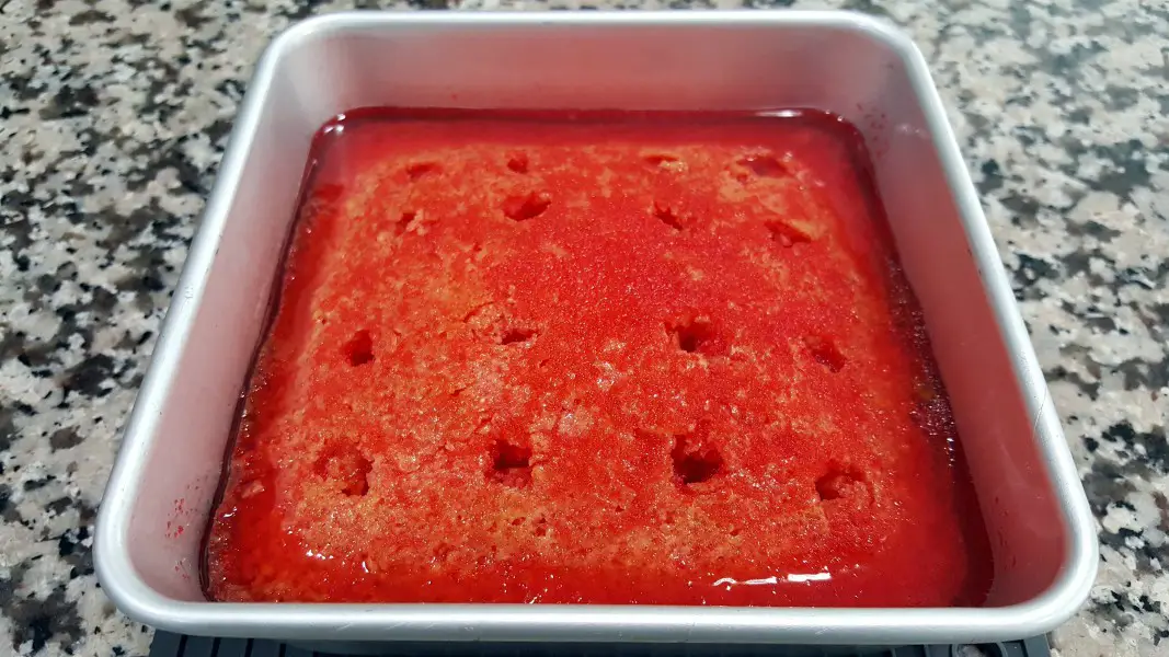 Homemade Jello Cake in a 6 inch pan.