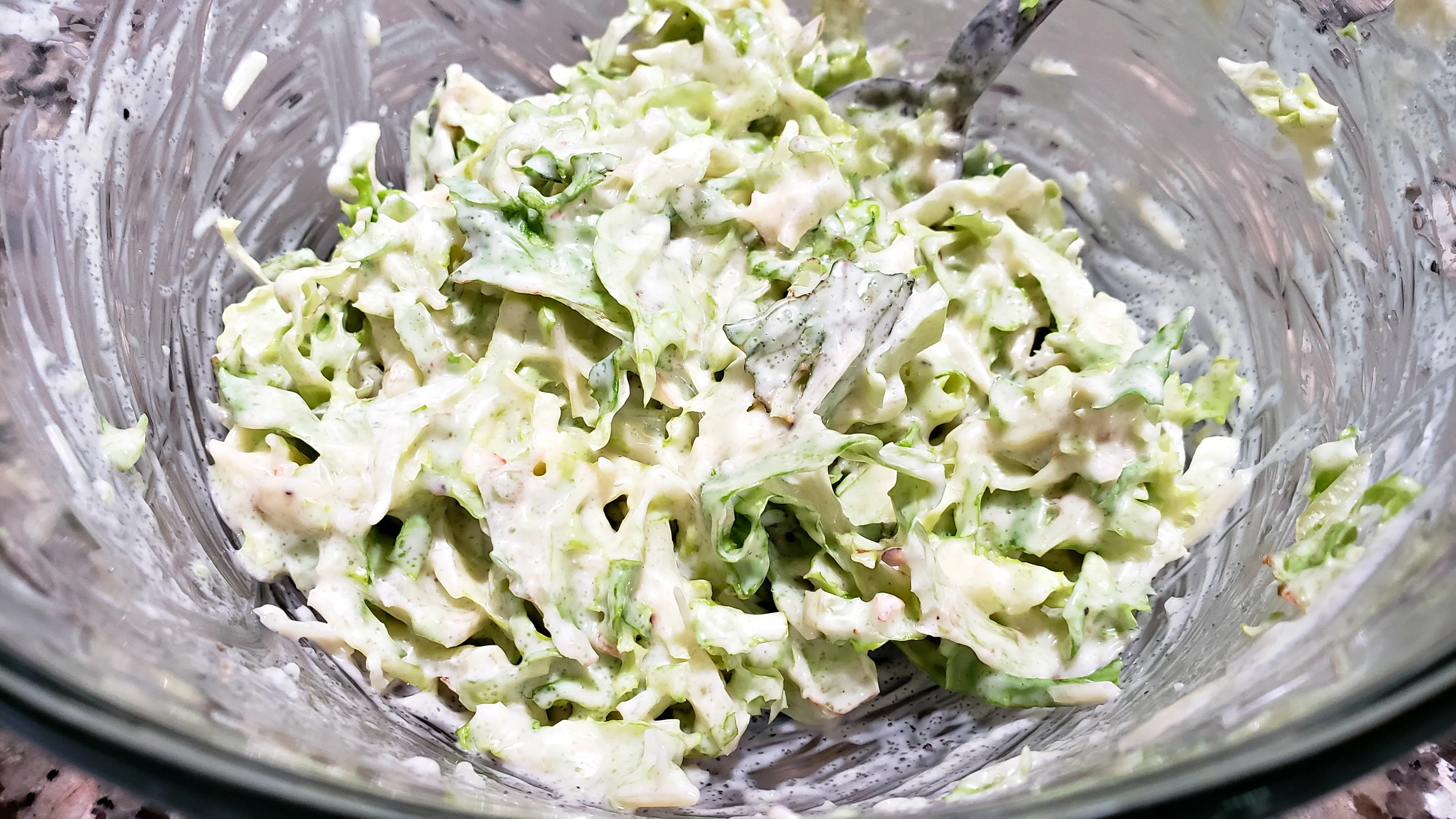 shredded lettuce mixed with creamy mayo and sugar mixture.