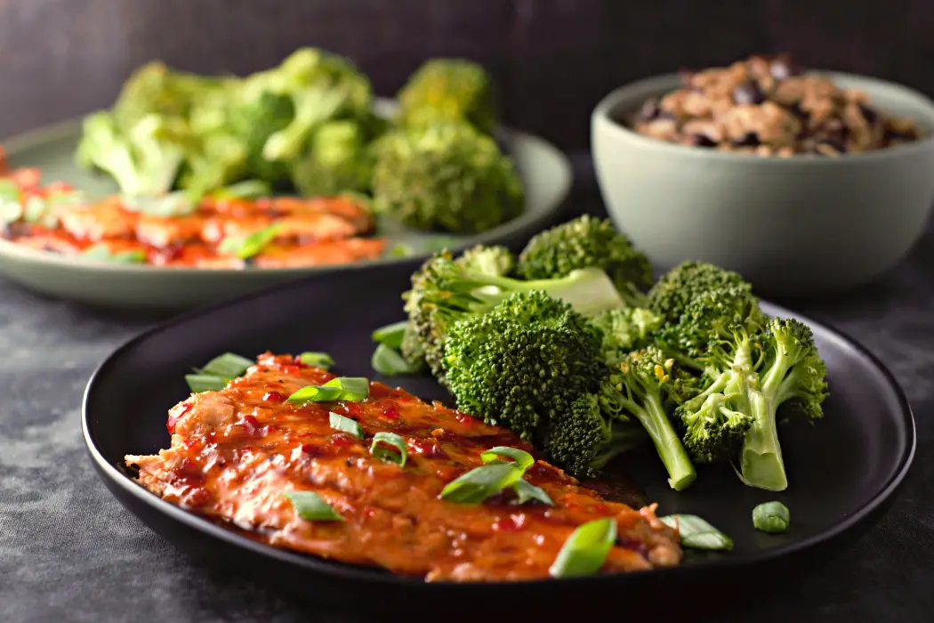 two plates filled with Thai Sweet Chili Salmon.