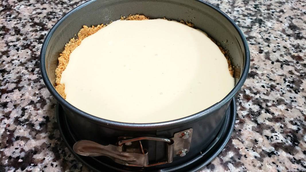 lemon cheesecake filling poured into 7 inch springform pan.