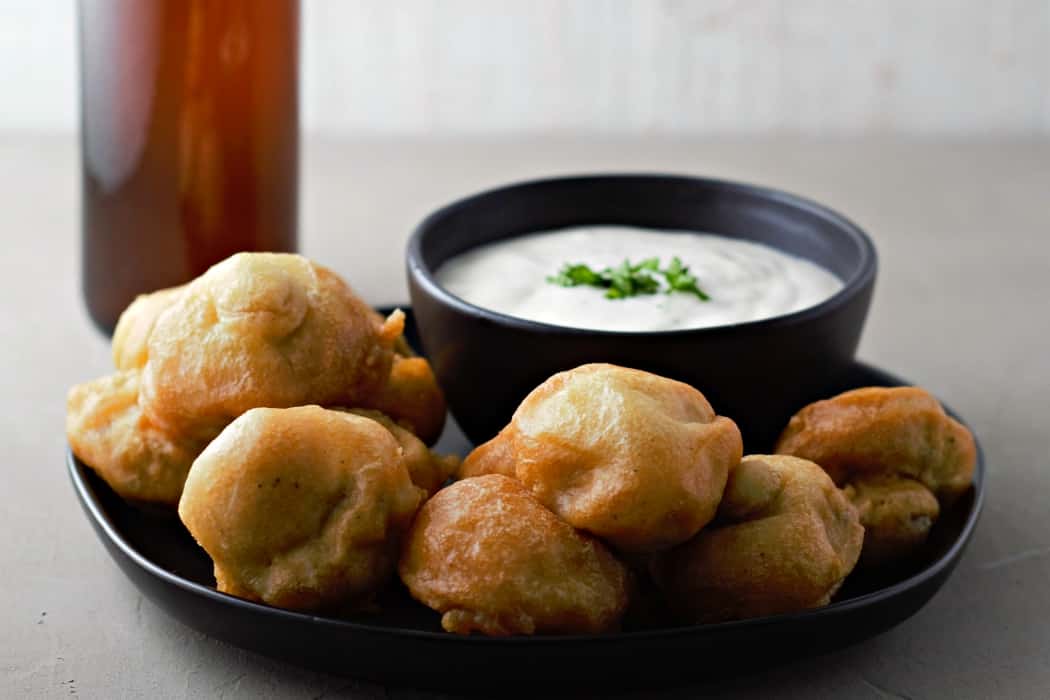 Deep Fried Beer Battered Mushrooms with ranch dipping sauce.