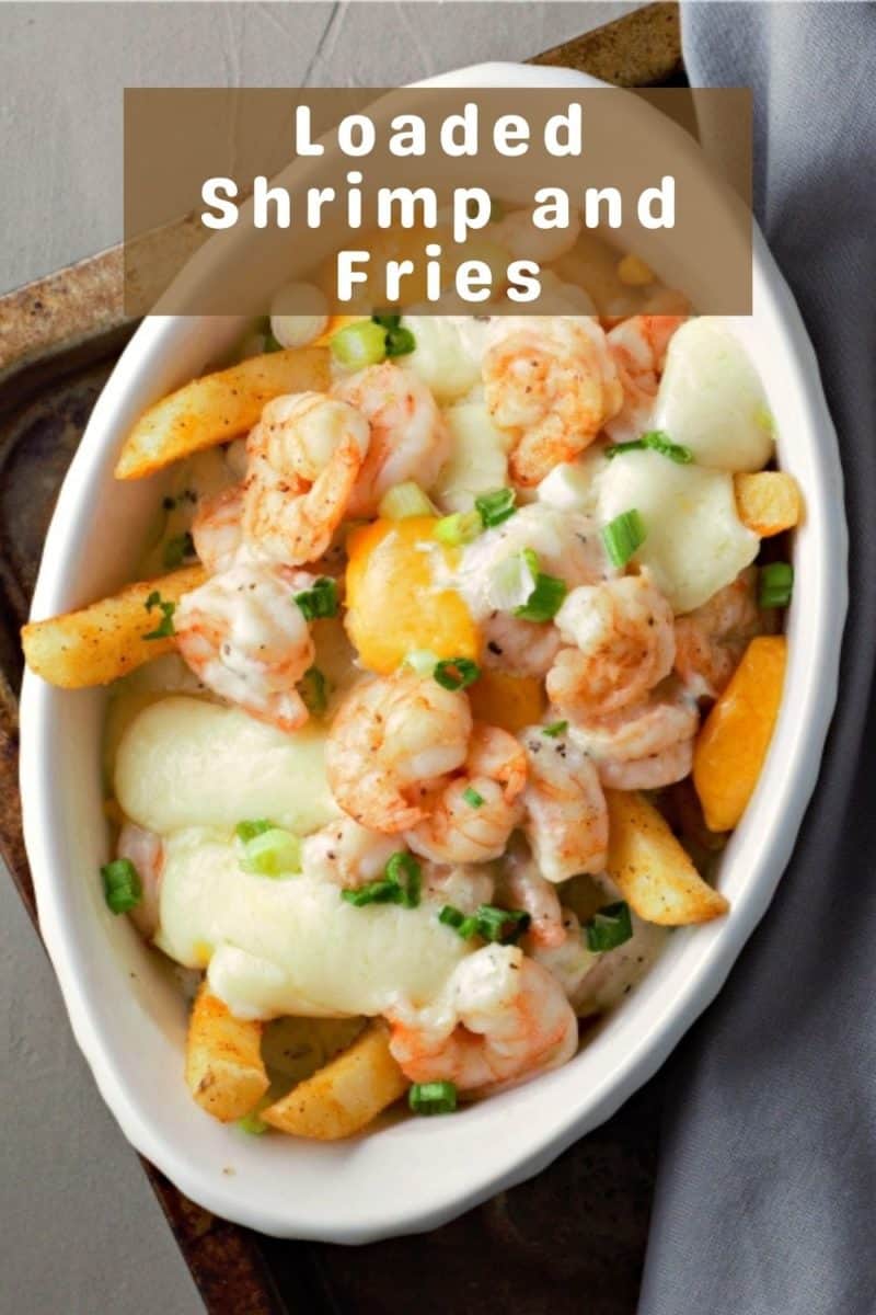 a casserole dish filled with Loaded Shrimp and Fries.