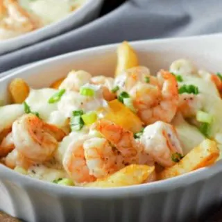 Loaded Shrimp and Fries in a baking dish.