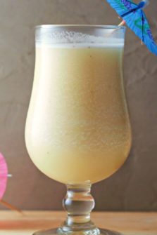 a Banana Daiquiri drink in a tall glass.